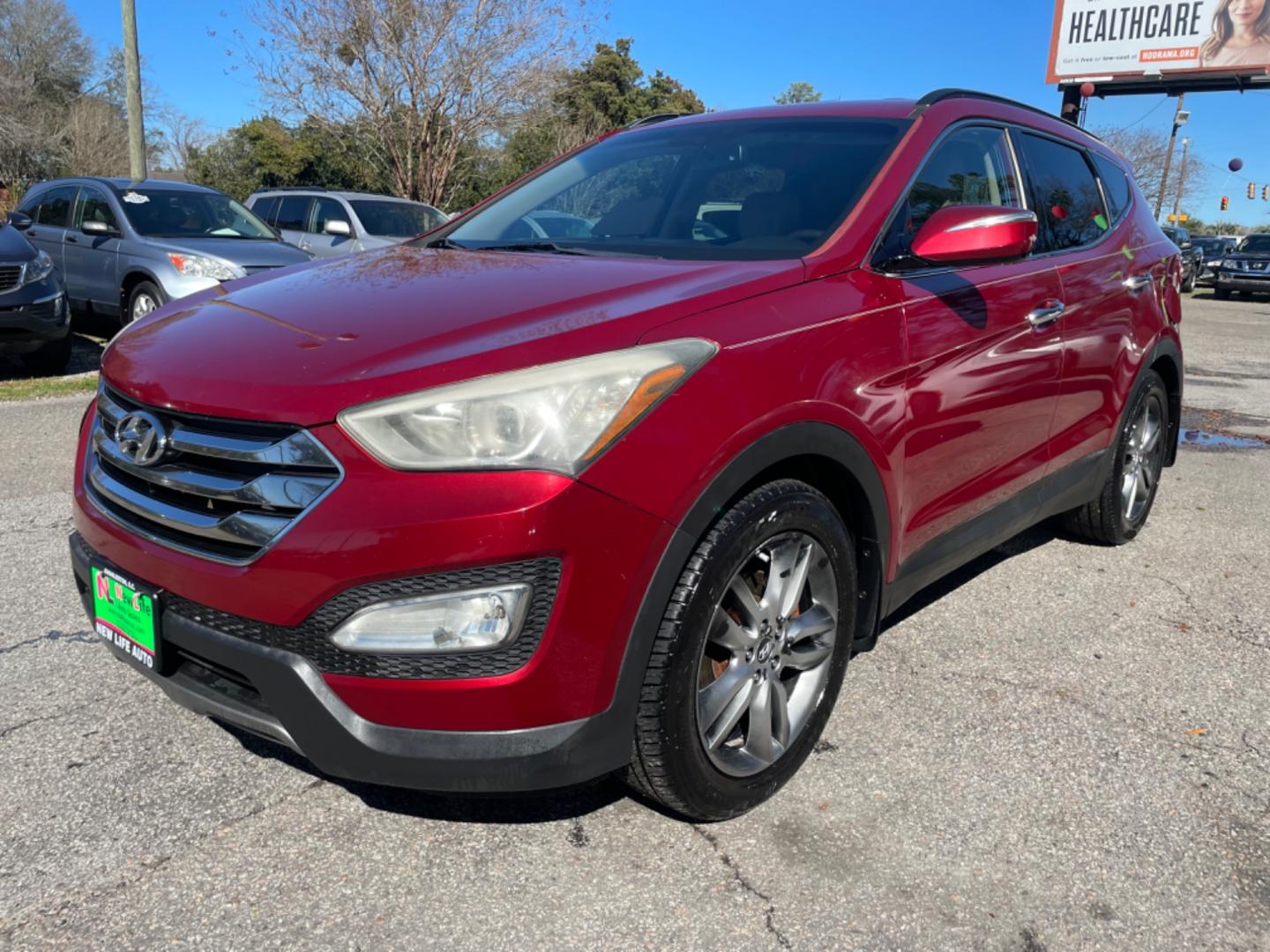 2013 RED HYUNDAI SANTA FE SPORT 2.0T (5XYZU3LA3DG) with an 2.0L engine, Automatic transmission, located at 5103 Dorchester Rd., Charleston, SC, 29418-5607, (843) 767-1122, 36.245171, -115.228050 - Leather, CD/AUX/Sat/Bluetooth, Dual Climate, Power Everything (windows, locks, seats, mirrors), Heated Seats, Rear Heated Seats, Push Button Start, Keyless Entry, Alloy Wheels. Local Trade-in!! Located at New Life Auto Sales! 2023 WINNER for Post & Courier's Charleston's Choice Pre-owned Car Dealer - Photo#2